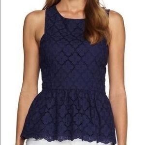 Navy eyelet peplum top, gold detail zipper